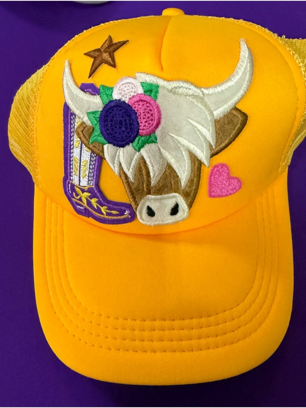 Yellow Embroidered Longhorn Trucker Hat with Floral Accent